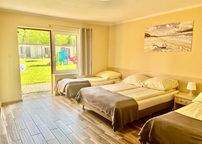 Kompleks wypoczynkowy Ośrodek Rodzinny Pod Wydmami Przy Plaży , Plac Zabaw , Rowery