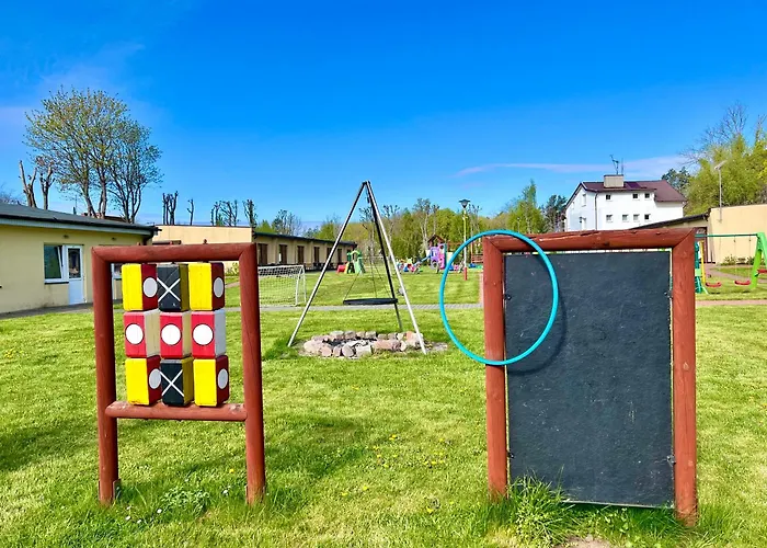 Kompleks wypoczynkowy Ośrodek Rodzinny Pod Wydmami Przy Plaży , Plac Zabaw , Rowery *