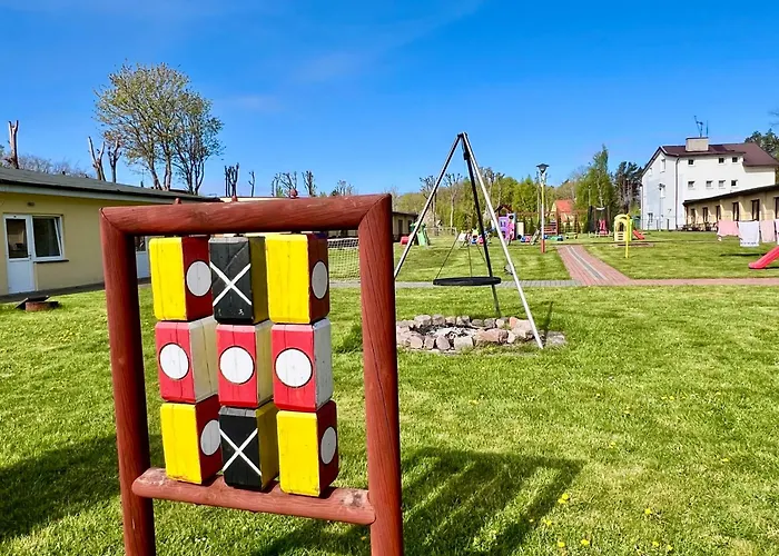 Kompleks wypoczynkowy Ośrodek Rodzinny Pod Wydmami Przy Plaży , Plac Zabaw , Rowery *
