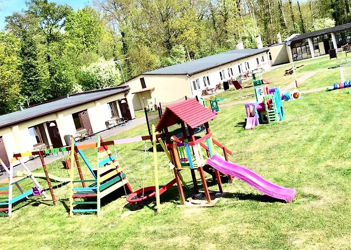 Kompleks wypoczynkowy Ośrodek Rodzinny Pod Wydmami Przy Plaży , Plac Zabaw , Rowery *