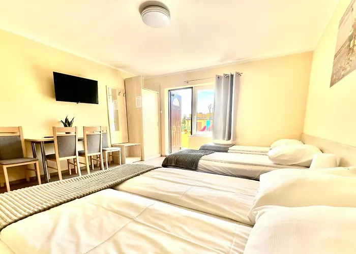 Kompleks wypoczynkowy Ośrodek Rodzinny Pod Wydmami Przy Plaży , Plac Zabaw , Rowery *